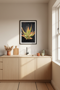 Bild in Galerie-Betrachter laden, Close-up photograph of a desert aloe plant with orange and green leaves on dark volcanic rock, perfect for modern botanical wall art