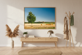 Bild in Galerie-Betrachter laden, Nature-inspired wall art with a serene harvest field, hay rolls, and a single standing tree.
