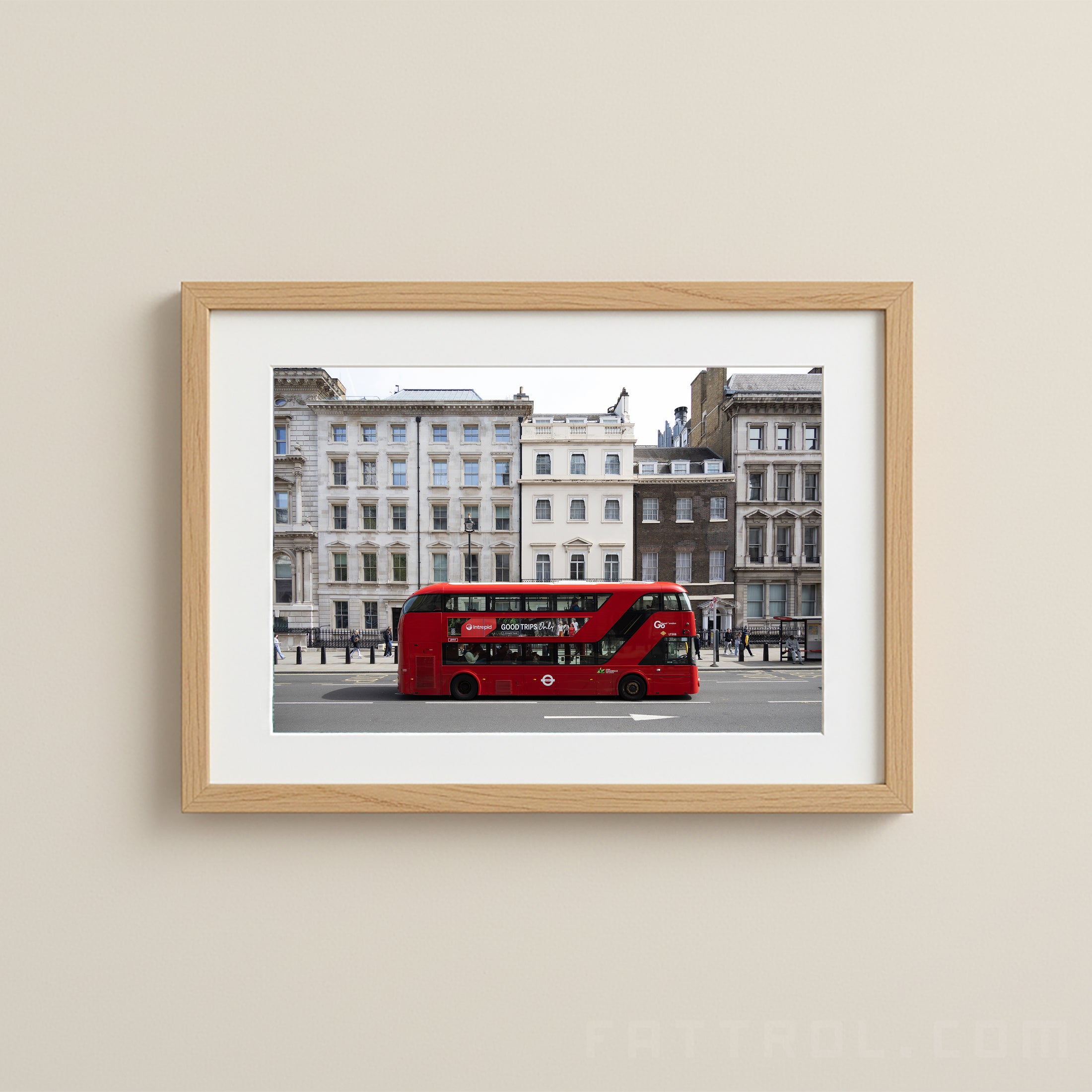 London Double Decker Bus photograph of a red double-decker bus on a city street with buildings in the background.