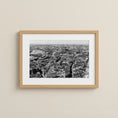 Load image into Gallery viewer, Framed black and white cityscape print on a beige wall
