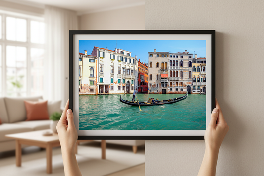 Scenic gondola ride on the Grand Canal in Venice, Italy with colorful historic buildings in the background