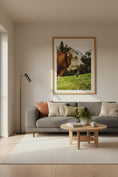 Load image into Gallery viewer, Living room with a gray sofa, wooden coffee table, and framed picture of a cow on the wall.
