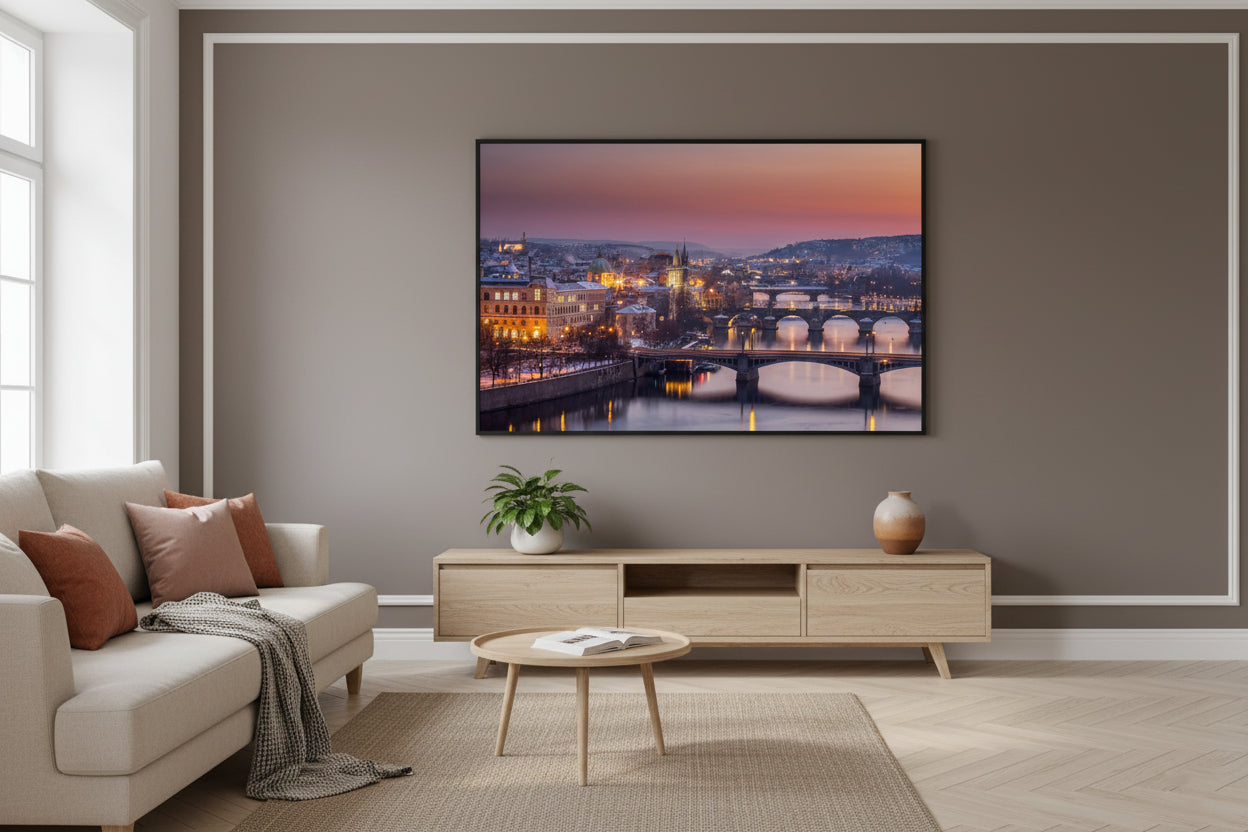 Romantic panoramic view of Prague bridges and historic buildings at sunset.