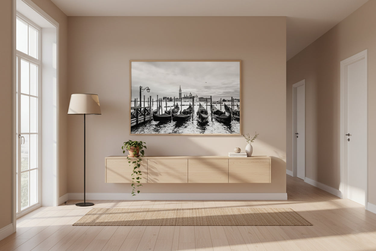 Modern living room with a large wall art piece depicting a harbor scene.
