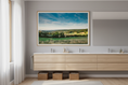 Load image into Gallery viewer, Wide countryside panorama with farmland and village surrounded by forest and gentle hills.
