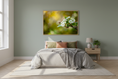 Load image into Gallery viewer, Honeybee landing on a flower cluster with soft golden bokeh in the background
