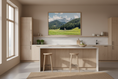 Load image into Gallery viewer, Modern kitchen with a painting of a mountain landscape on the wall.
