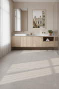 Load image into Gallery viewer, Modern bathroom with wooden vanity, white countertop, and framed artwork on the wall.
