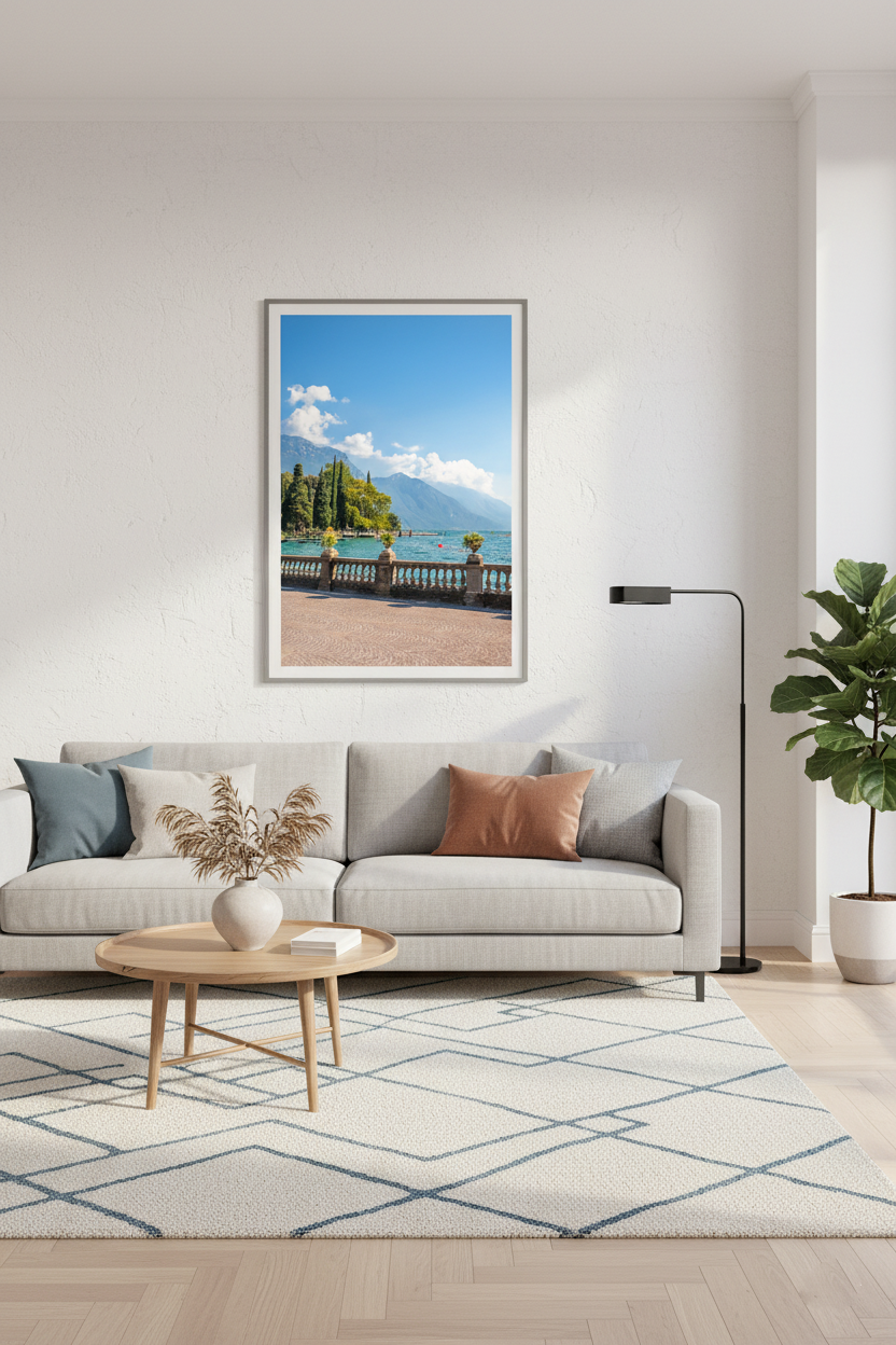 Fine art photo of Riva del Garda promenade overlooking Lake Garda and distant peaks.