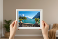 Load image into Gallery viewer, Lake Garda in northern Italy with calm water, mountain backdrop, and vibrant greenery
