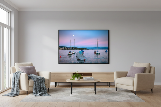 Tranquil evening scene on Lake Zürich with boats and mountain view under a rising moon