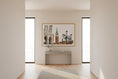 Load image into Gallery viewer, Modern interior with a framed picture of a cityscape on a wall.

