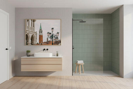 Modern bathroom with wooden vanity, sink, and shower area.